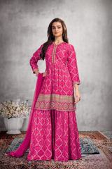 Sleeveless girls' Rani Pink party dress featuring a large 3D rose on the bodice and a full, voluminous skirt.