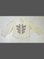 Girls' cream/ivory long-sleeved blouse with button-down front, puff sleeves, and a colorful maroon, green, and brown folk-art embroidery design on the chest.

Export to Sheets