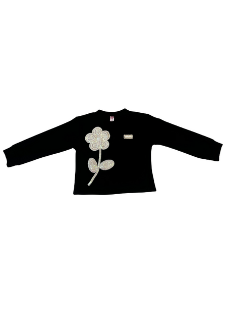 Girls' long-sleeved black top with a large, sparkly flower appliqué made of rhinestones or pearls on the chest.

Export to Sheets