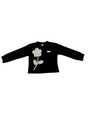 Girls' long-sleeved black top with a large, sparkly flower appliqué made of rhinestones or pearls on the chest.

Export to Sheets