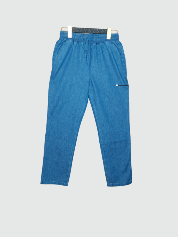 Medium blue boys' casual drawstring pants in a denim-look fabric, featuring an elastic waist and a small horizontal zipper detail on the hip
