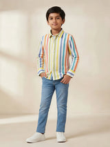 Boys wearing a multicolor vertical striped full sleeve casual button-down shirt paired with blue jeans