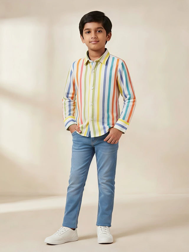 Boys wearing a multicolor vertical striped full sleeve casual button-down shirt paired with blue jeans