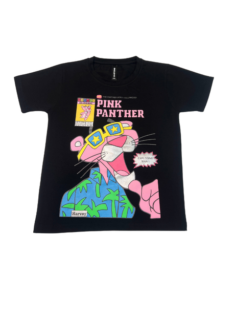Black short-sleeve kids' T-shirt with a retro Pink Panther graphic print wearing yellow sunglasses and a blue Hawaiian shirt. The design includes the title "PINK PANTHER" and "THE PANTHER GOES HOLLYWOOD!".