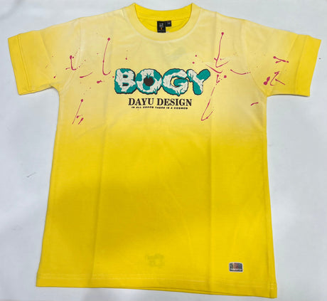 Vibrant yellow boys' short-sleeve T-shirt with an ombre fade, featuring a central "BOGY" graphic with teal outline and scattered pink paint splatters