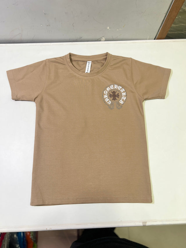 Tan/Brown boys' short-sleeve T-shirt with a small circular distressed cross and text logo graphic on the left chest, hanging on a white background.
