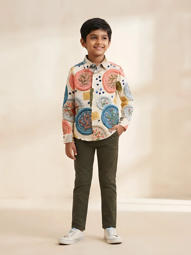 Cream embroidered pattern shirts and t-shirt set for boys displayed on a white background.