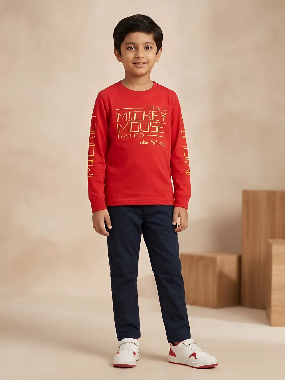 Boys wearing a red full sleeve t-shirt with yellow graphic text print