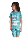 Young boy with curly hair wearing a teal/blue tie-dye T-shirt with a bold white graphic print and a zipper pocket, matched with tie-dye cargo shorts for a casual summer look.