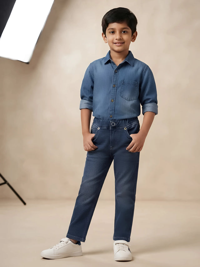 L.Blue solid washed denim pant for boys with an elastic waistband.