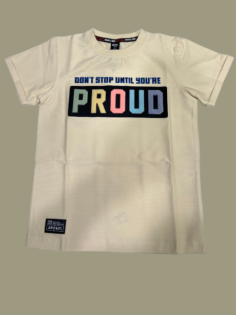 Cream/Off-White boys' short-sleeve T-shirt with a textured fabric and a large graphic patch that reads "DON'T STOP UNTIL YOU'RE PROUD" with colorful block letters for "PROUD.