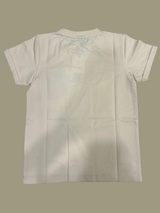 Cream/Beige boys' short-sleeve T-shirt with subtle horizontal texture, featuring the motivational text "JUST DON'T GIVE UP" and a solid black patch pocket on the chest