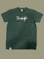 Dark Hunter Green boys' short-sleeve T-shirt with a white "Free Spirit" script and a small cartoon graphic of a backpacker figure