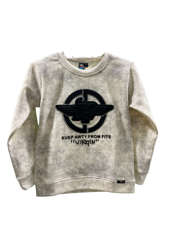 Cream/off-white boys' short-sleeve T-shirt with subtle horizontal ribbing, featuring a large navy blue patch with the word "PROUD" in multi-colored letters, and "DON'T STOP UNTIL YOU'RE" written above it