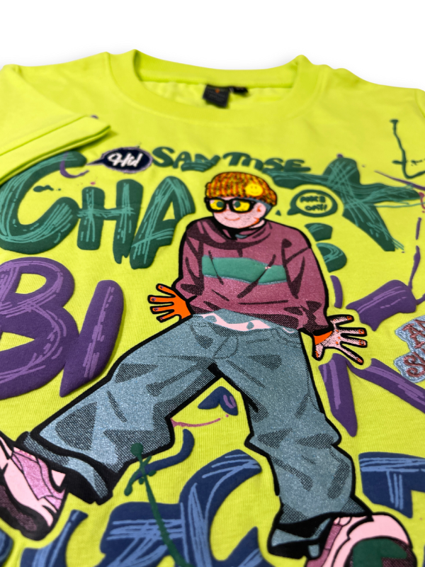 Boys' bright neon green short-sleeve t-shirt featuring a colorful graphic of a character wearing a cap and glasses, surrounded by purple and blue graffiti text and paint splatters.

Export to Sheets