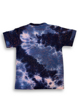 Boys' dark blue t-shirt with orange bleach-effect tie-dye and a central embroidered slogan with the word 'NICE' in bright, abstract colors.

Export to Sheets