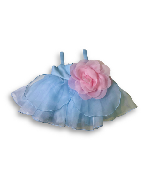 Girls' sleeveless light blue tiered tulle dress with a large, sheer pink flower appliqué on the chest and delicate shoulder straps.

Export to Sheets