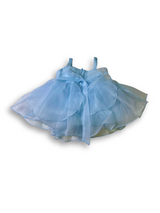 Girls' sleeveless light blue tiered tulle dress with a large, sheer pink flower appliqué on the chest and delicate shoulder straps.

Export to Sheets
