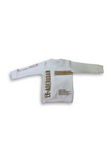 Boys' ombré t-shirt that fades from cream/white to dark grey, featuring a colorful pixelated graphic of a head wearing a blue beanie and the text "Rock 'n Roll."

Export to Sheets