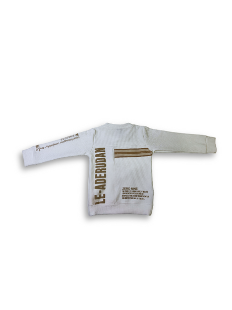 Boys' ombré t-shirt that fades from cream/white to dark grey, featuring a colorful pixelated graphic of a head wearing a blue beanie and the text "Rock 'n Roll."

Export to Sheets