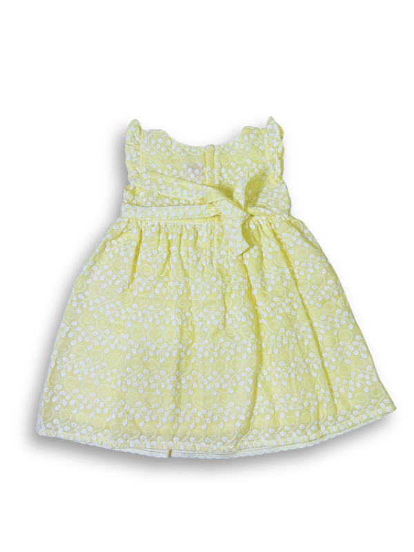 Bright yellow girls' dress with white floral eyelet embroidery, a wide embroidered border at the hem, and small ruffle cap sleeves.

Export to Sheets