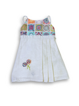 White girls' sleeveless dress with beige floral cutwork embroidery and a thin champagne-colored satin ribbon belt/sash.

Export to Sheets