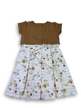 Girls' two-piece outfit featuring a brown textured bolero jacket with embroidery over a white and beige striped floral print dress with pleats.

Export to Sheets