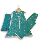 Girls' dress with a gray and white plaid bodice that fades into a blue ombre pleated skirt, featuring light blue organza puff sleeves and 3D white flower belt detail.