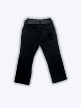 Boys' black straight-fit pants with the word 'ULTIMATE' printed/embroidered on the side, shown with an included silver-buckle belt against a white background.