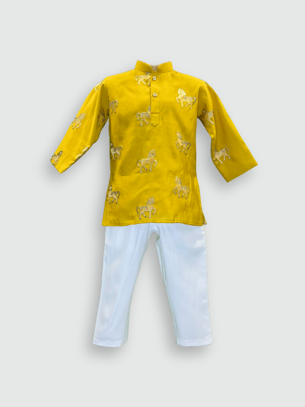 Boys' bright Haldi yellow full-sleeve kurta featuring a repeating gold embroidered horse motif, paired with solid white straight-fit pajama bottoms. The ethnic set is shown against a plain background