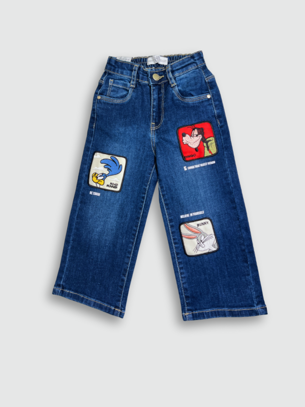 Dark blue wash children's wide-leg denim jeans with large square cartoon character patches (including Road Runner and Bugs Bunny) on the front of the legs