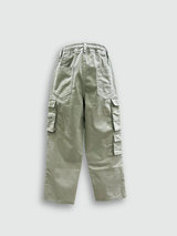 Olive green boys' cargo pants with a relaxed fit, featuring large side flap pockets, an elasticated drawstring waist, and knee stitching detail