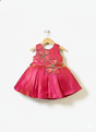 Hot pink sleeveless girls' party frock on a hanger, featuring a shimmering skirt, a silver waistband, and two large pink butterfly flower appliqués on the chest.