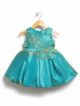 Lime green girls' flared frock (mini anarkali) on a hanger, featuring a yellow/green floral print and heavy gold embroidery around the neckline.