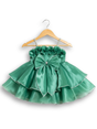 Teal green girls' sleeveless party frock on a hanger, featuring a shimmering pleated skirt and two large flower appliqués made from gold cord on the bodice.