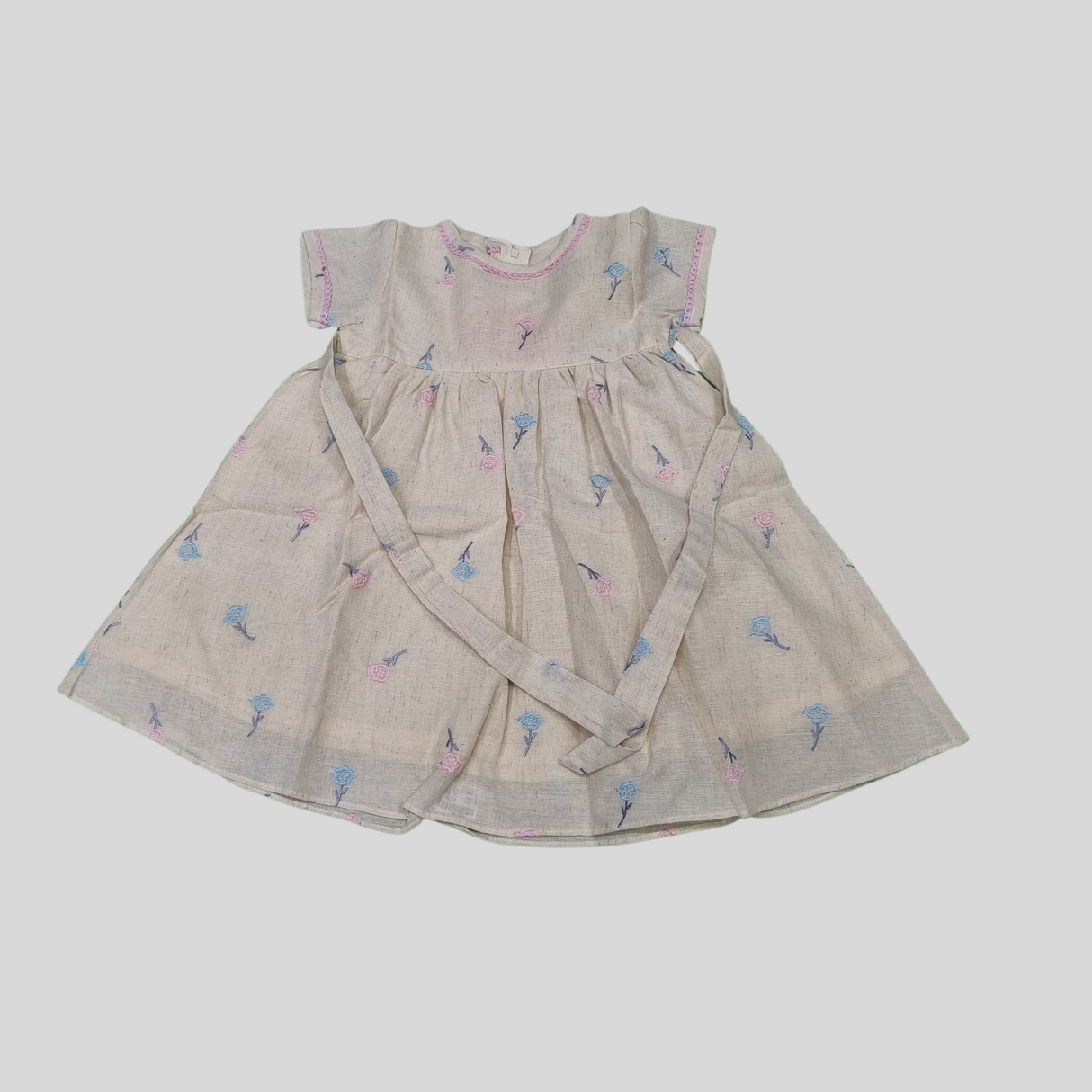 Baby Girls’ Soft Beige Floral Dress – Cotton Linen Summer Frock with Tie-Back