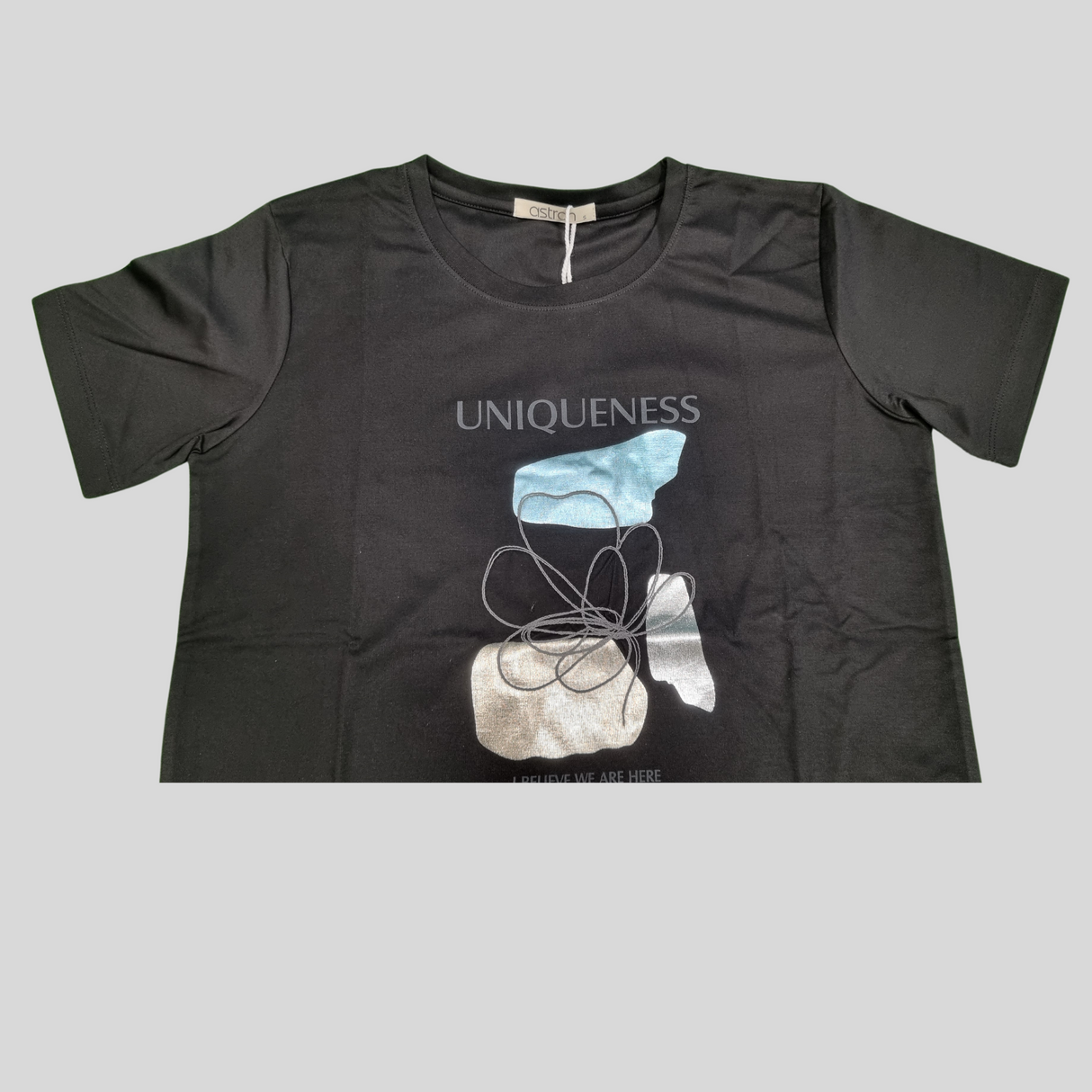 Girl's Graphic T-Shirt – “UNIQUENESS” Artistic Inspirational Print