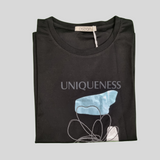 Girl's Graphic T-Shirt – “UNIQUENESS” Artistic Inspirational Print