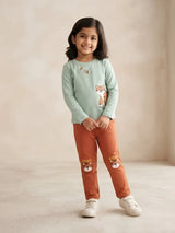 Girls light green full sleeve t-shirt with tiger graphic paired with rust brown trousers