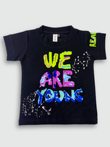 Black boys' short-sleeve T-shirt featuring a large multi-colored neon graphic print that reads 'WE ARE YOUNG' with white paint splatter effects.