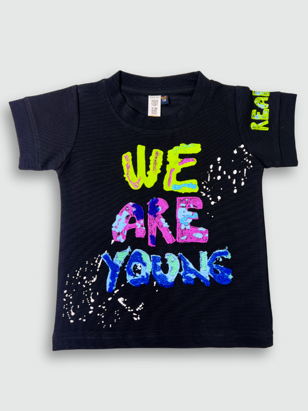 Black boys' short-sleeve T-shirt featuring a large multi-colored neon graphic print that reads 'WE ARE YOUNG' with white paint splatter effects.