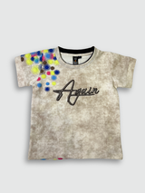 Boys' short-sleeve T-shirt featuring a cream, blue, and maroon marble-like print with the black text 'ULTIMATE' across the chest.