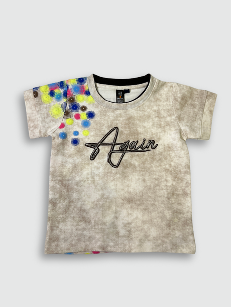 Boys' short-sleeve T-shirt featuring a cream, blue, and maroon marble-like print with the black text 'ULTIMATE' across the chest.